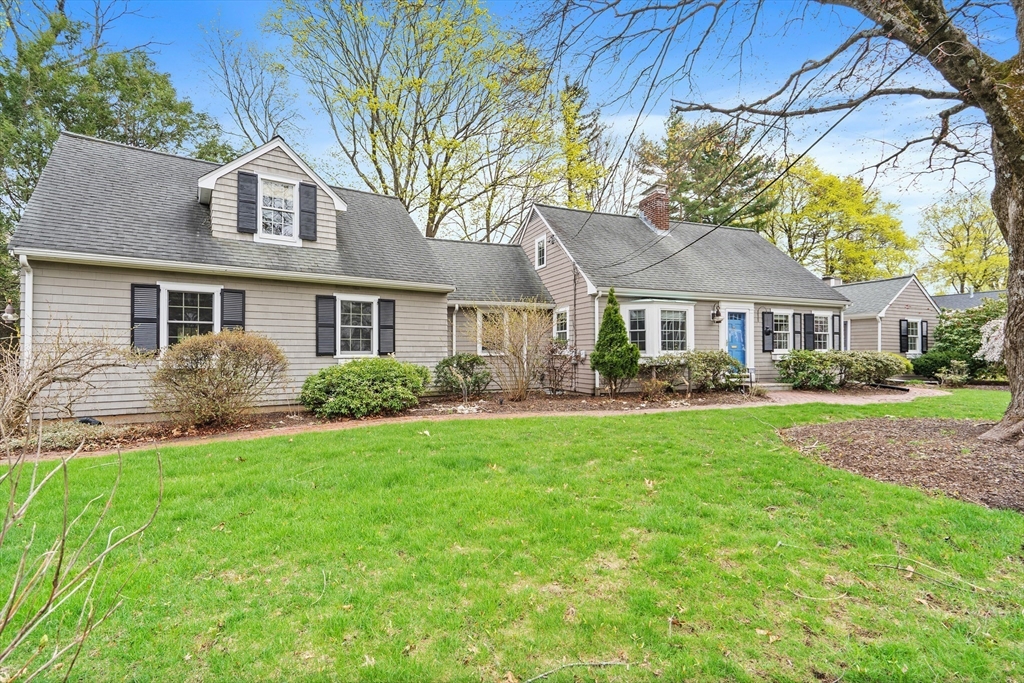 2270 Massachusetts Avenue Lexington, MA 02421 - Photo 3 of 33 a front view of a house with a yard and trees