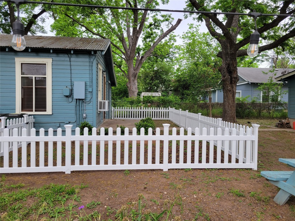 2511 East 2nd Street, Unit B Austin, TX 78702 - Photo 2 of 11 a view of a wooden fence