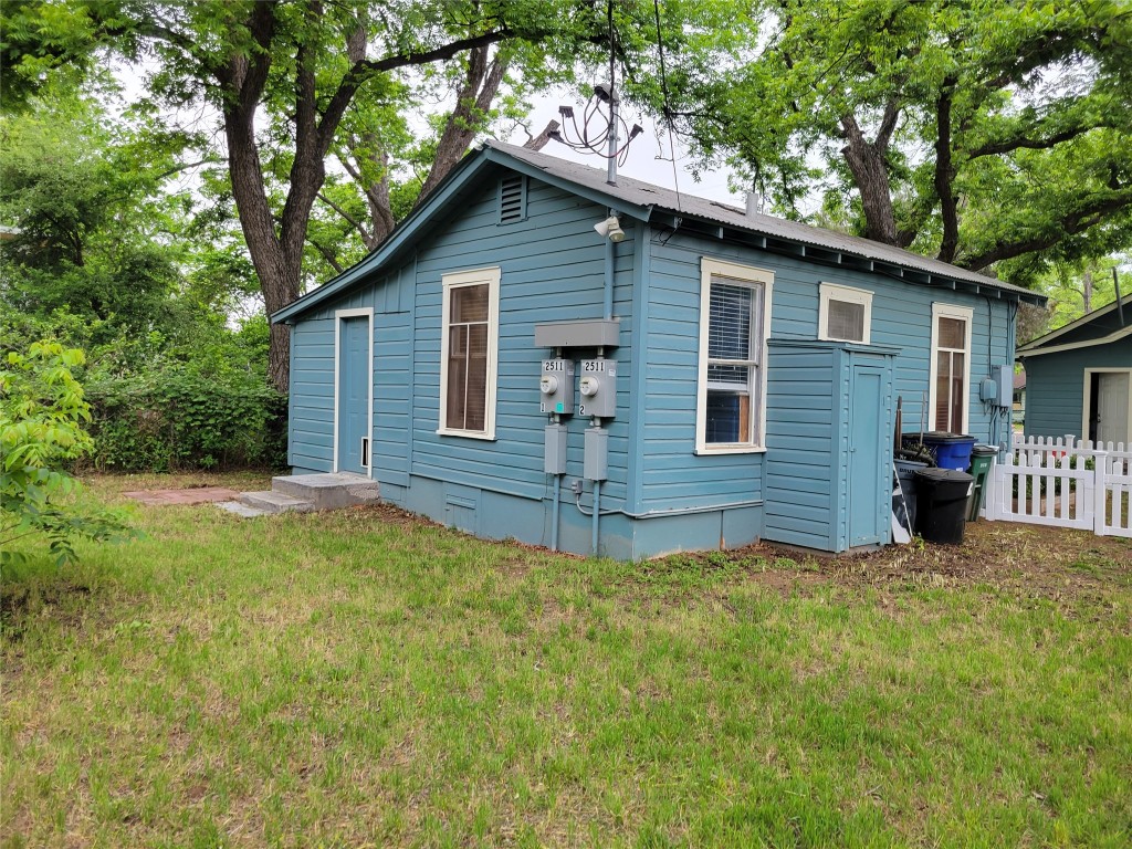2511 East 2nd Street, Unit B Austin, TX 78702 - Photo 3 of 11 a view of a house with a yard
