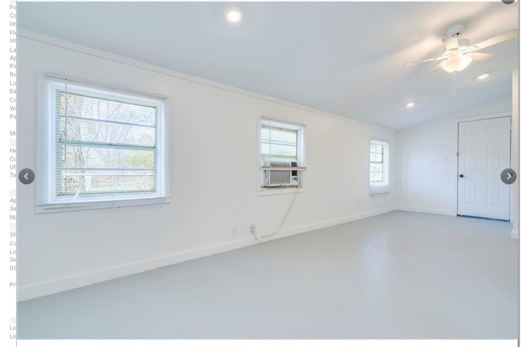 2511 East 2nd Street, Unit B Austin, TX 78702 - Photo 7 of 11 an empty room with windows and ceiling fan