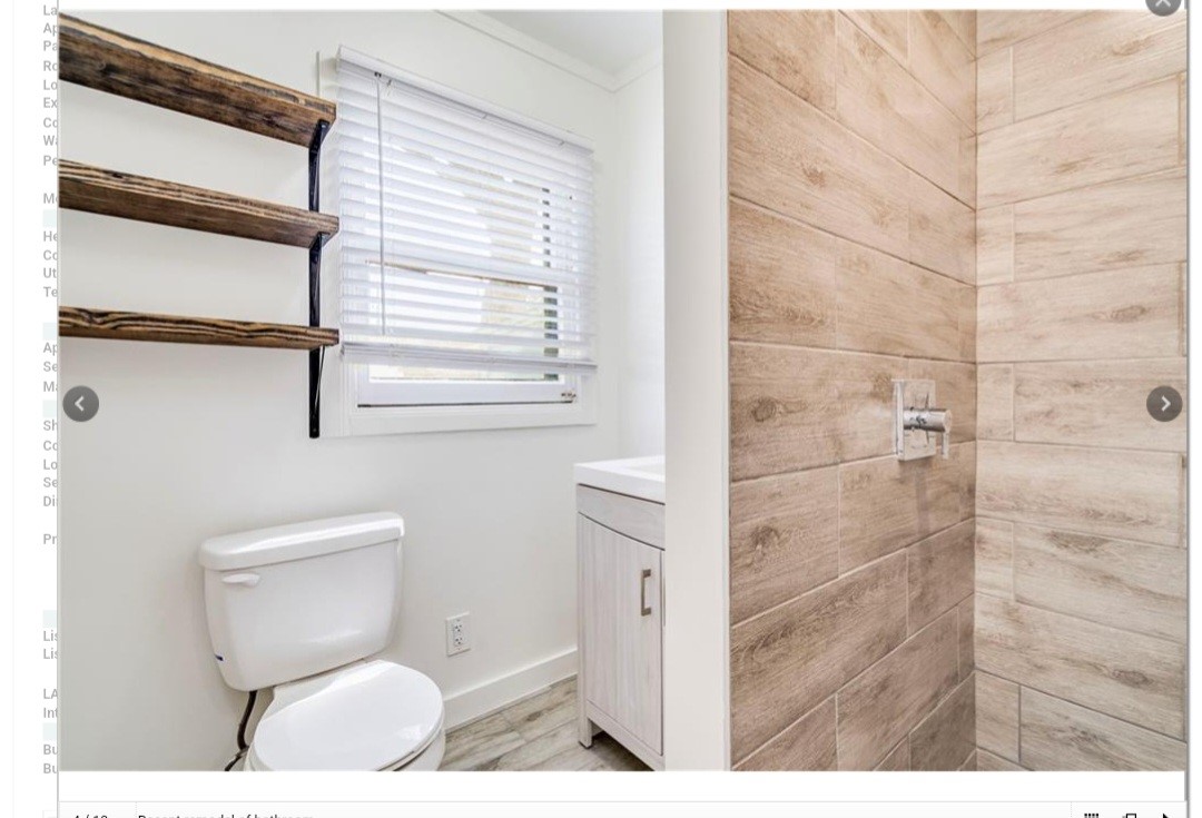 2511 East 2nd Street, Unit B Austin, TX 78702 - Photo 9 of 11 a bathroom with a toilet and a shower