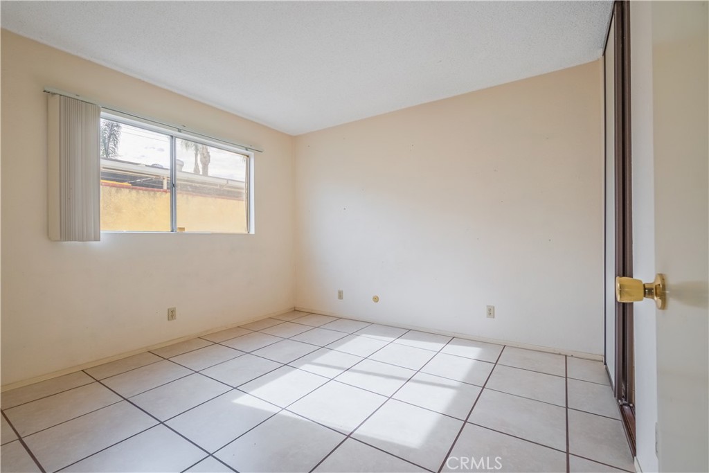 6084 Vanessa Street Riverside, CA 92504 - Photo 21 of 35 a view of an empty room with a window