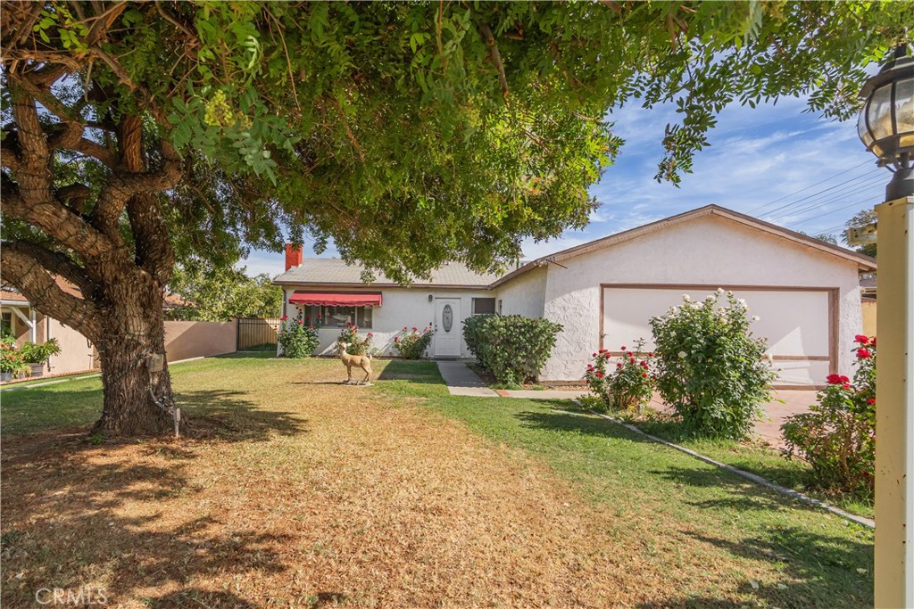 6084 Vanessa Street Riverside, CA 92504 - Photo 34 of 35 a view of a house with yard and tree s
