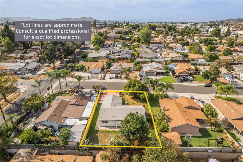 6084 Vanessa Street Riverside, CA 92504 - Photo 5 of 35 an aerial view of residential building with parking