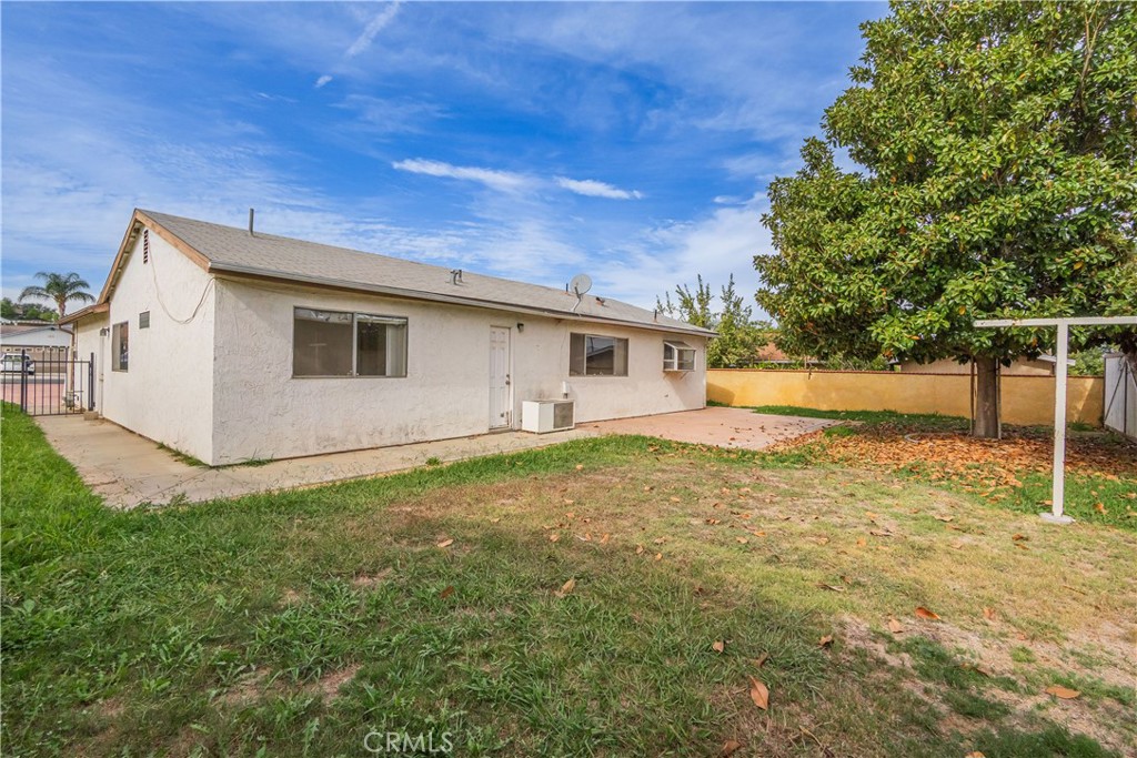 6084 Vanessa Street Riverside, CA 92504 - Photo 10 of 35 a view of a backyard with large trees