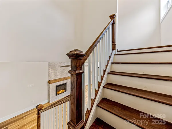 a view of a hallway with a chandelier