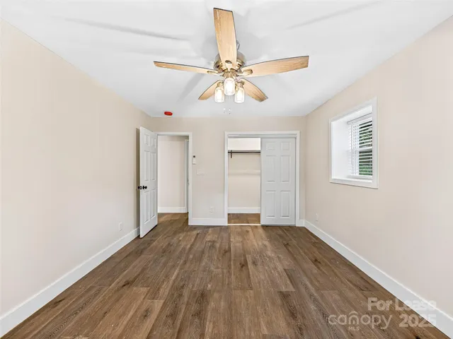 a view of balcony with wooden floor