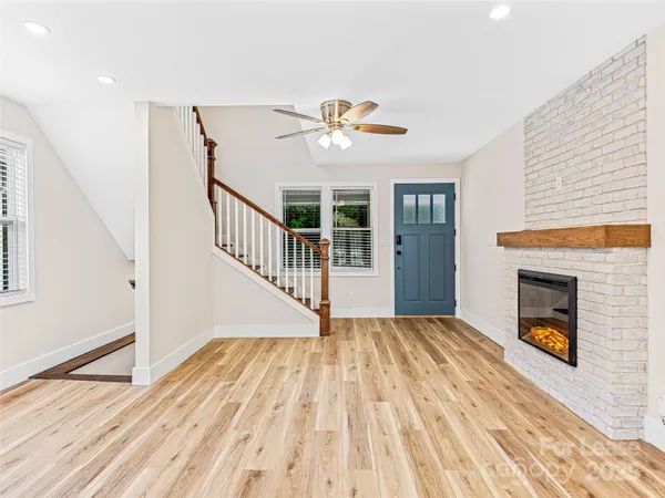a stove top oven sitting inside of a kitchen