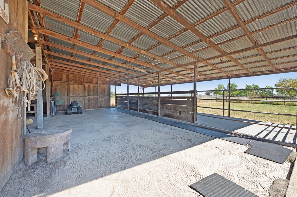 23180 Maffei Road Sonoma, CA 95476 - Photo 55 of 61 Looking into the open covered area of the barn with concrete floors.