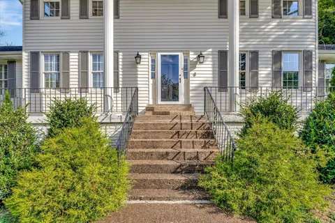 a view of a house with a white door