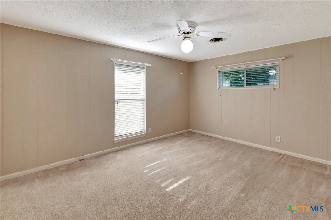 919 Eden Roc Street Victoria, TX 77904 - Photo 19 of 36 an empty room with windows