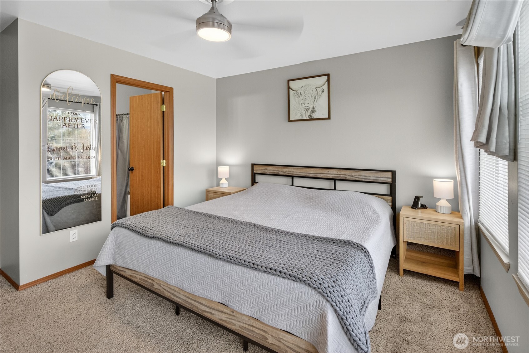 1506 Historic Lane Wenatchee, WA 98801 - Photo 12 of 28 a bedroom with a bed and a chandelier