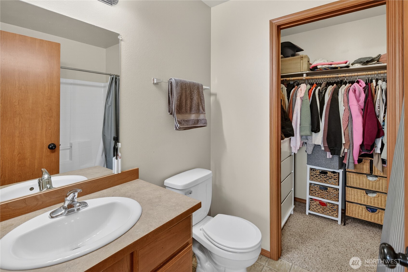 1506 Historic Lane Wenatchee, WA 98801 - Photo 16 of 28 a bathroom with a sink vanity mirror and toilet