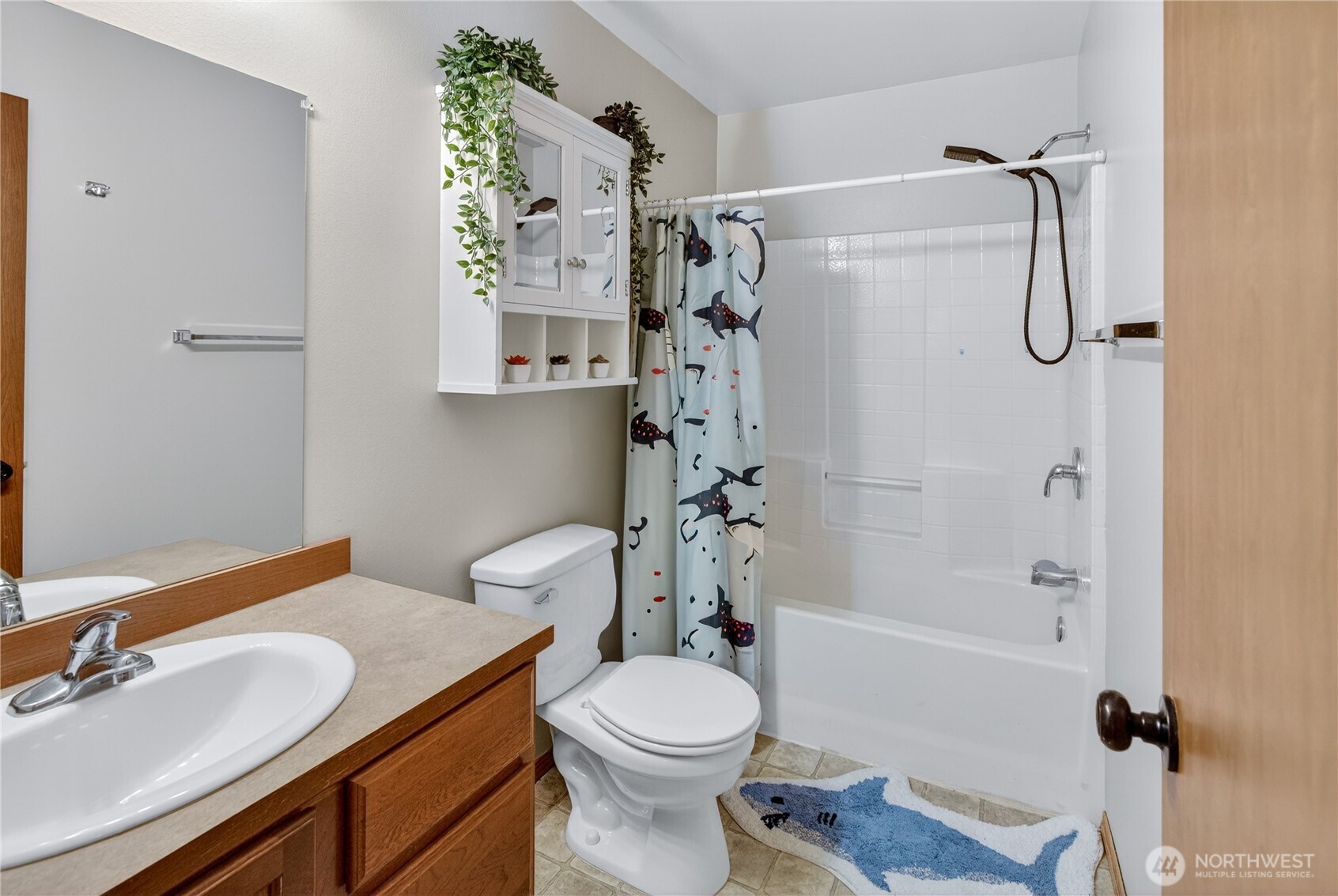 1506 Historic Lane Wenatchee, WA 98801 - Photo 21 of 28 a bathroom with a sink toilet and shower