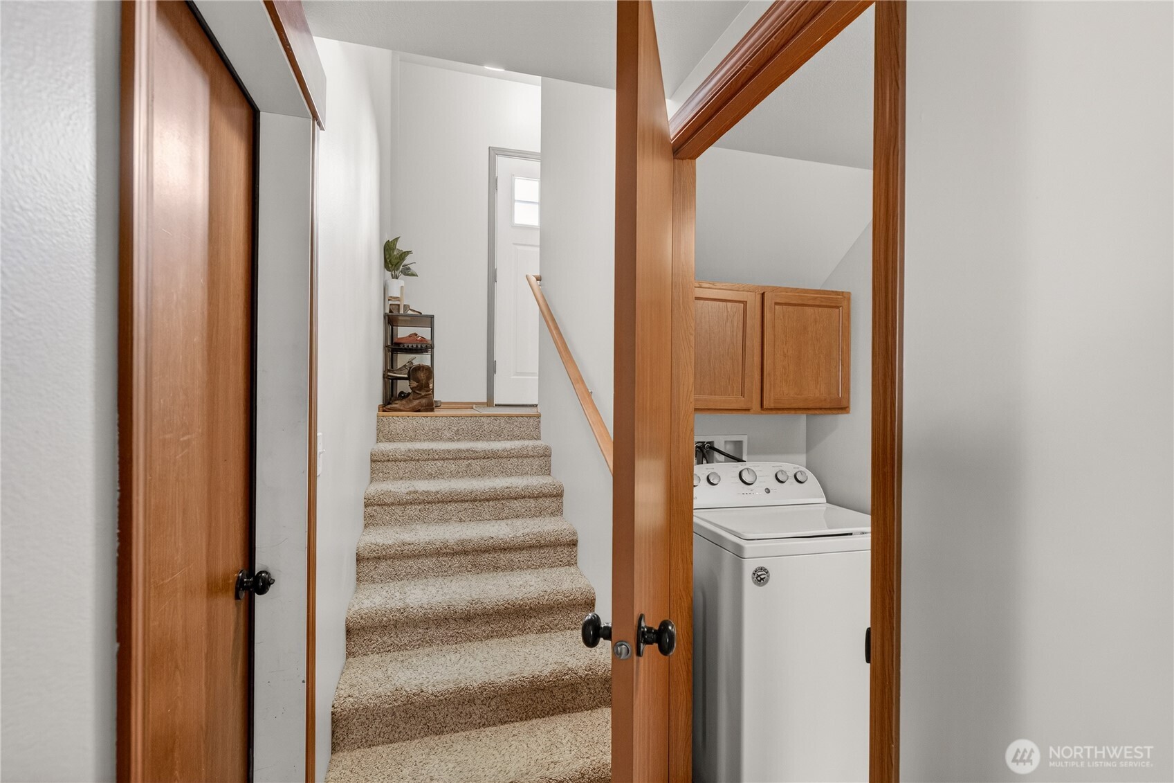 1506 Historic Lane Wenatchee, WA 98801 - Photo 22 of 28 a view of a hallway with wooden floor and entryway