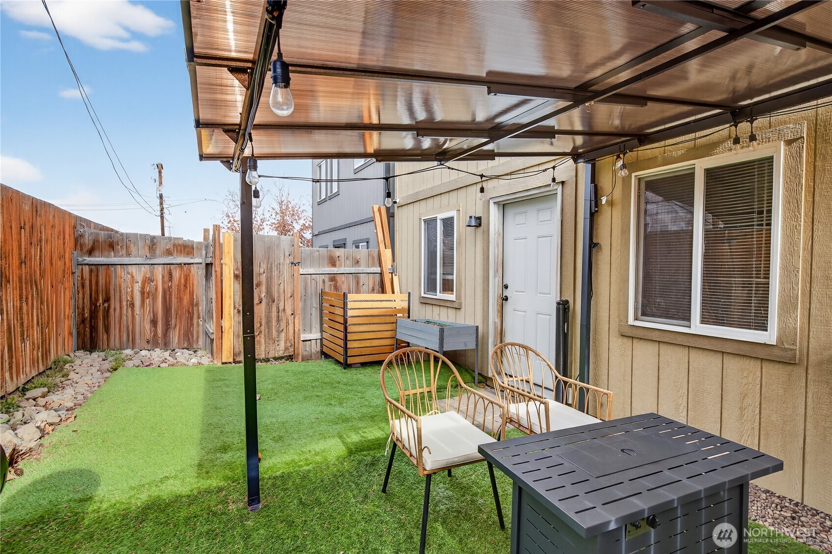 1506 Historic Lane Wenatchee, WA 98801 - Photo 27 of 28 a view of a house with backyard and wooden fence