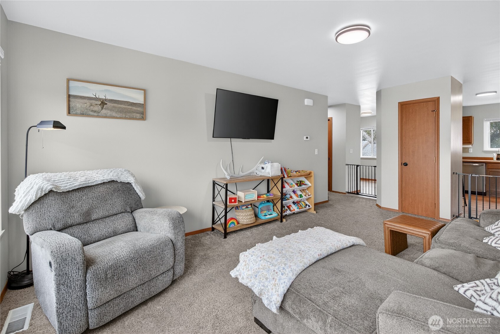 1506 Historic Lane Wenatchee, WA 98801 - Photo 8 of 28 a living room with furniture and a flat screen tv
