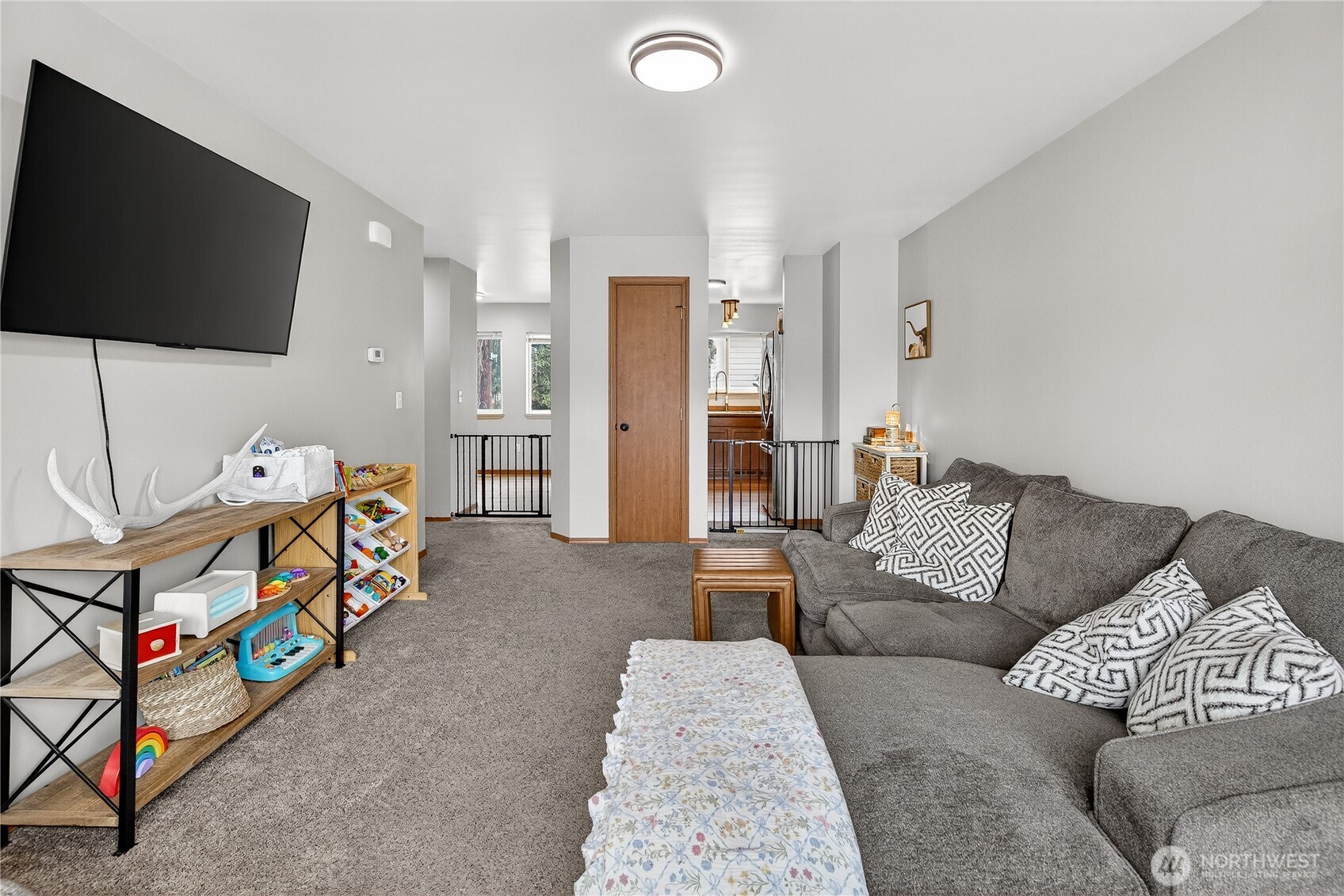 1506 Historic Lane Wenatchee, WA 98801 - Photo 10 of 28 a living room with furniture and a flat screen tv