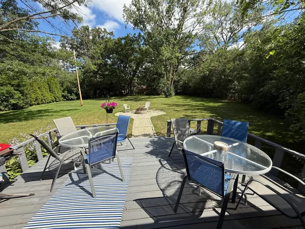 a view of a lounge chairs on the deck