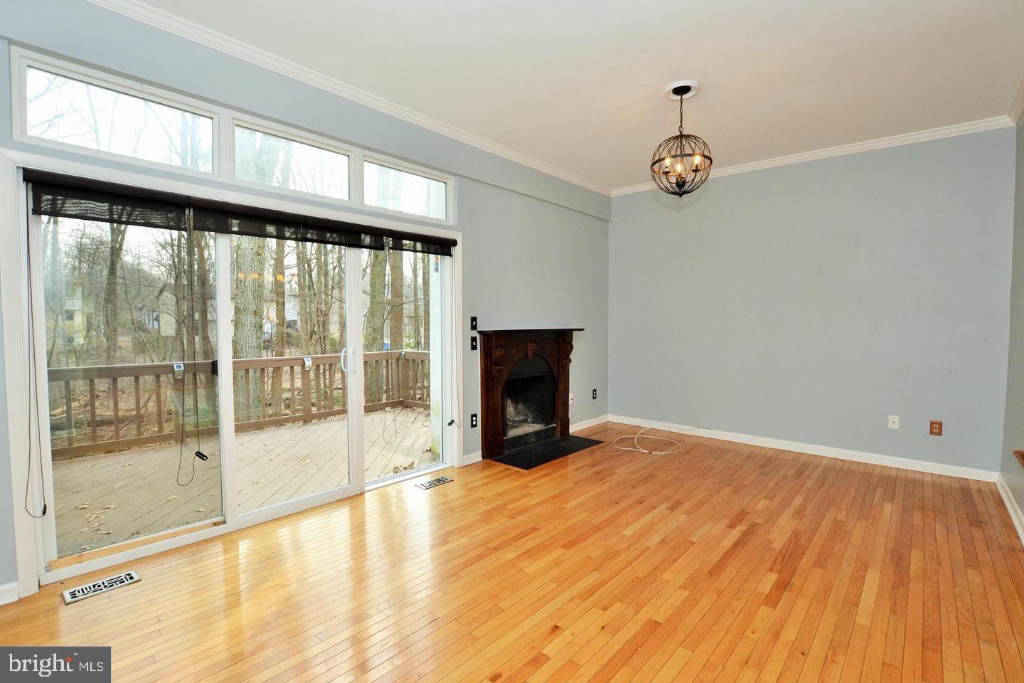 2369 Generation Drive Reston, VA 20191 - Photo 8 of 39 Deck off living room with fireplace