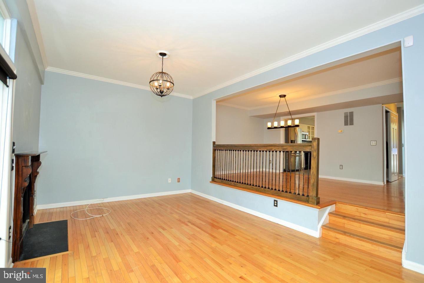 2369 Generation Drive Reston, VA 20191 - Photo 10 of 39 Step down to living room.