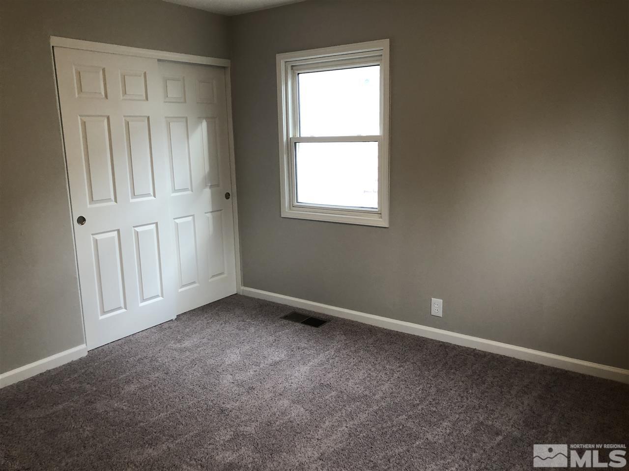 799 Lodge Avenue Reno, NV 89503 - Photo 5 of 6 an empty room with windows