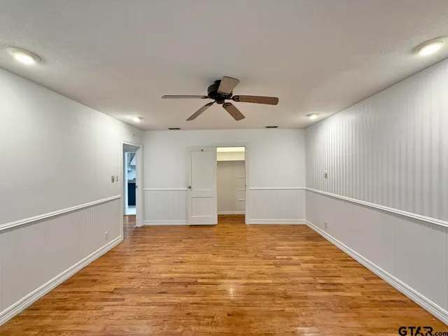 a view of a room with racks on the wall