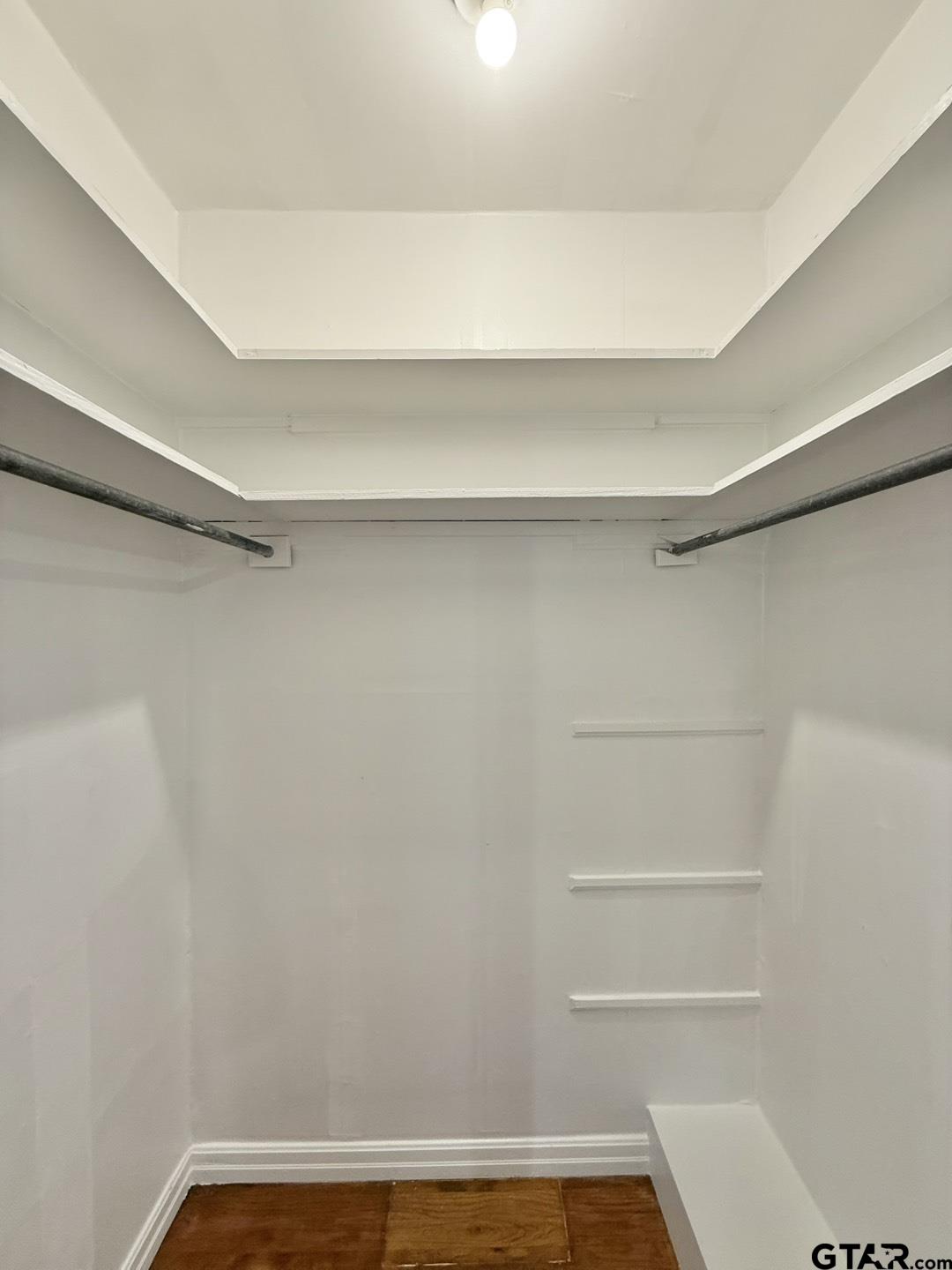 603 Wilma Street Tyler, TX 75701 - Photo 22 of 26 a view of a room with racks on the wall