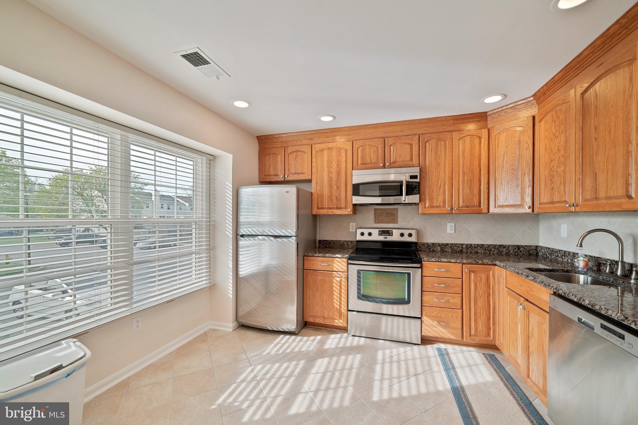 1682 Ridgely Court Crofton, MD 21114 - Photo 2 of 29 Gorgeous Light Filled Kitchen w/SS Appl's!