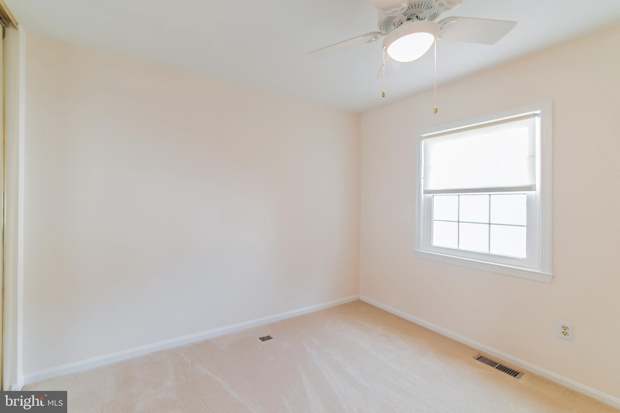 1682 Ridgely Court Crofton, MD 21114 - Photo 21 of 29 2nd Bedroom w/ Ceiling Fan & Neutral Paint