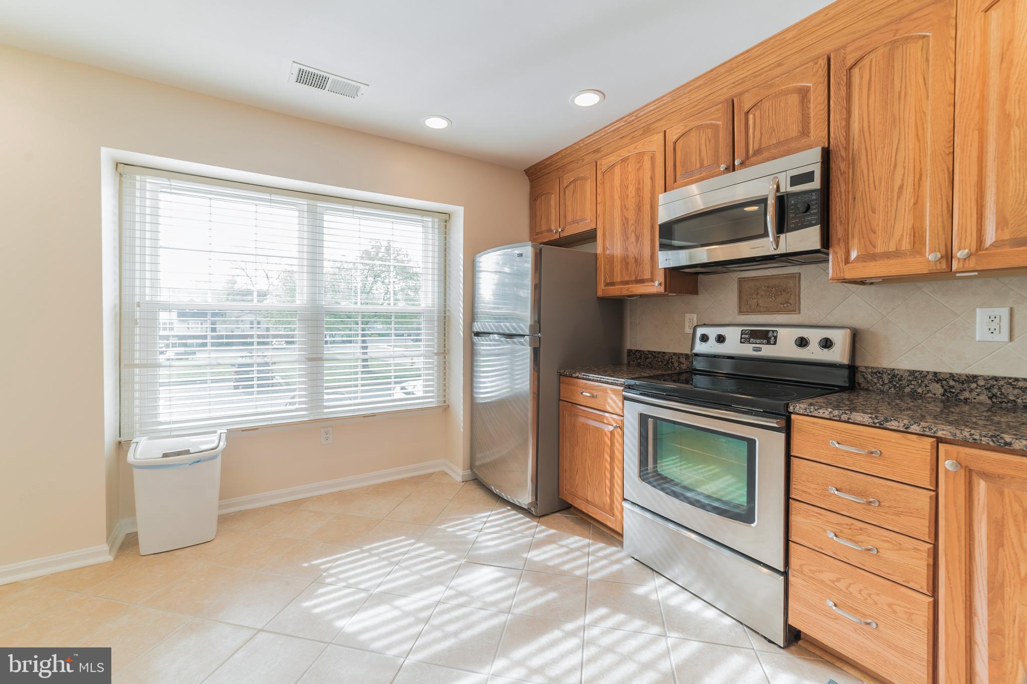 1682 Ridgely Court Crofton, MD 21114 - Photo 4 of 29 Table Space in the Kitchen w/Recessed Lights!
