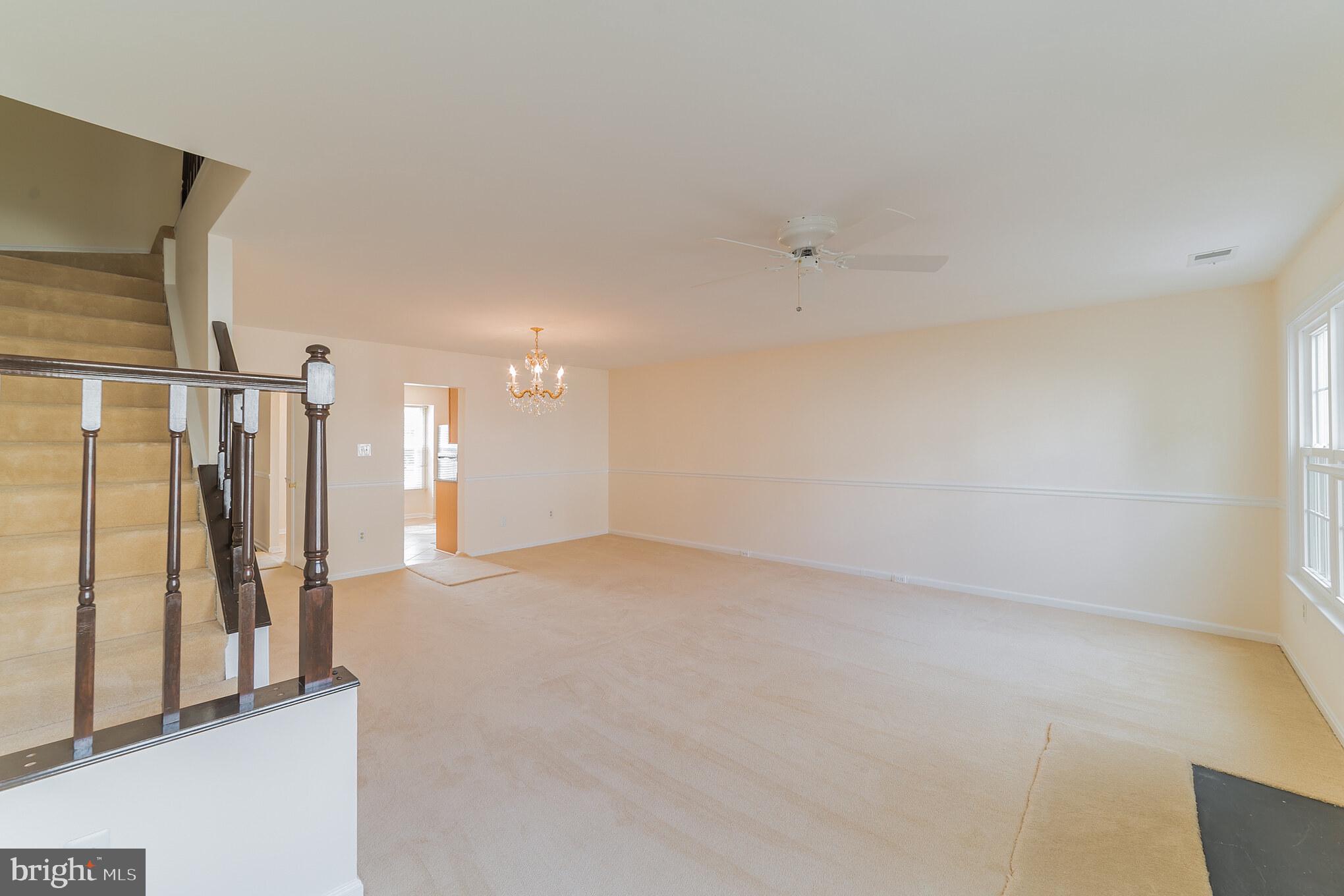 1682 Ridgely Court Crofton, MD 21114 - Photo 8 of 29 Living & Dining area w/Chandelier & Ceiling Fan!