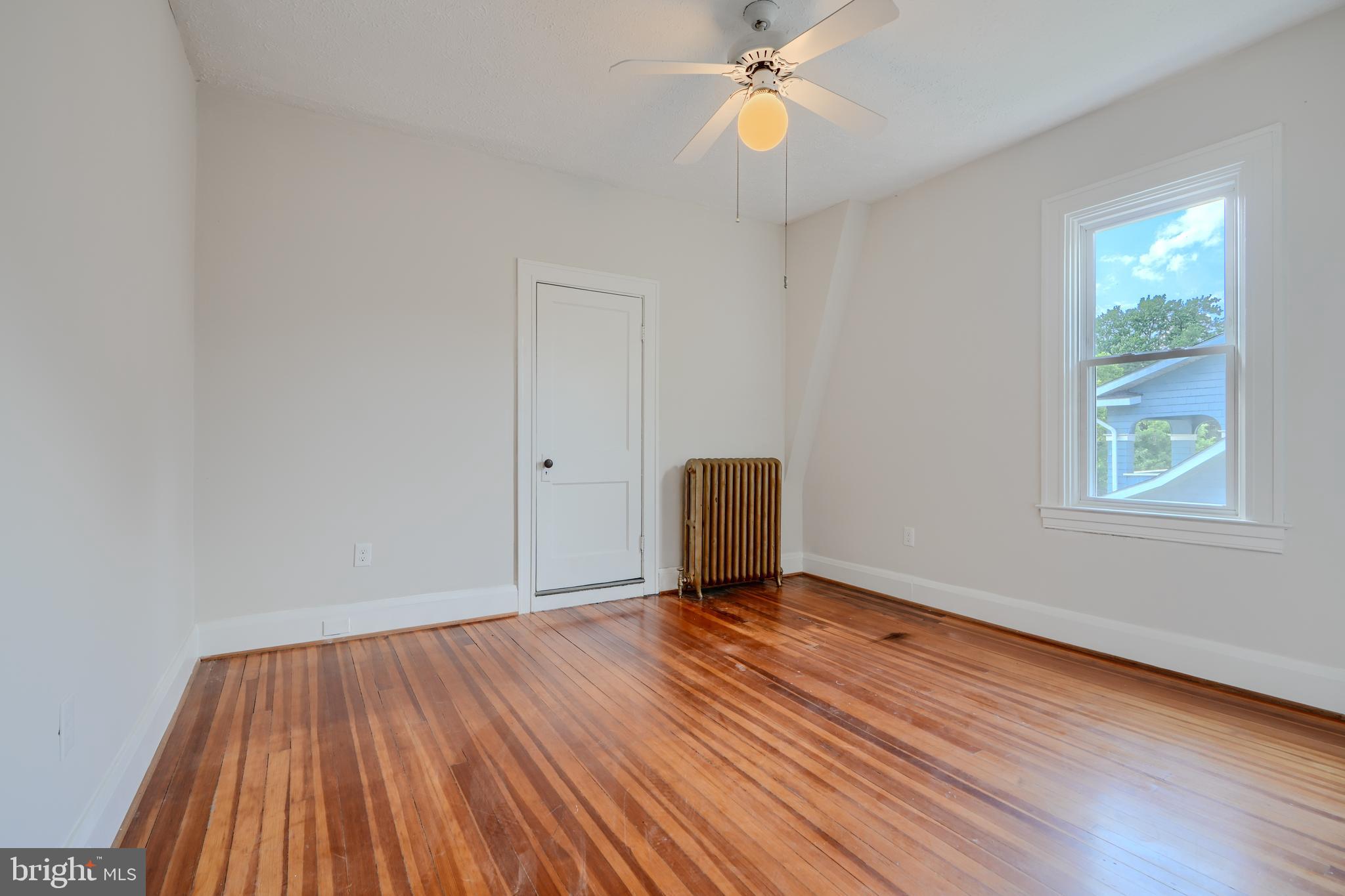 224 Mallow Hill Road Baltimore, MD 21229 - Photo 42 of 52 Hardwood floors and overhead lighting