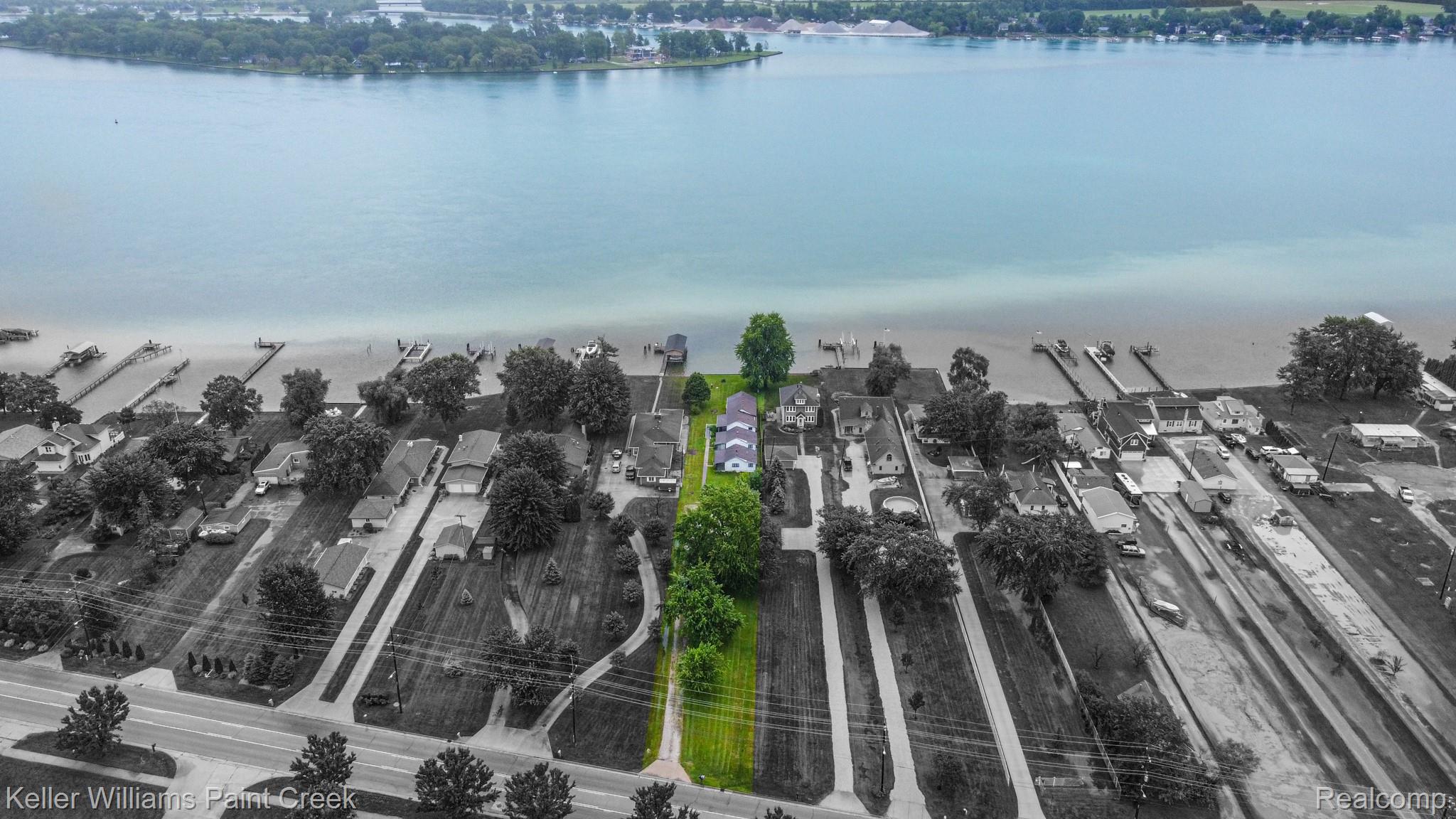 6533 River Road Marine City, MI 48039 - Photo 1 of 17 Aerial view of residential area with a nearby body of water