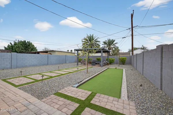 a bathroom with a toilet and a vanity