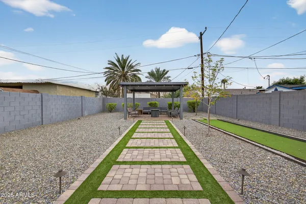 a view of a backyard with a slide