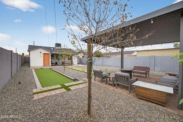 a view of a swimming pool with a lounge chair