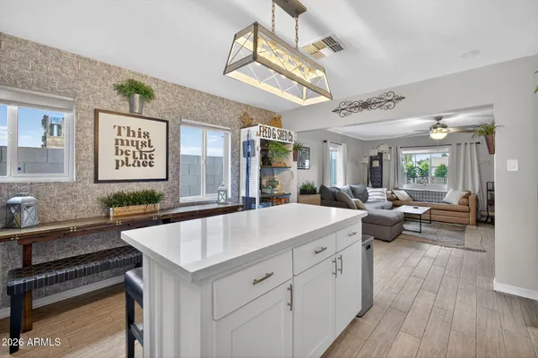a view of a porch with potted plants