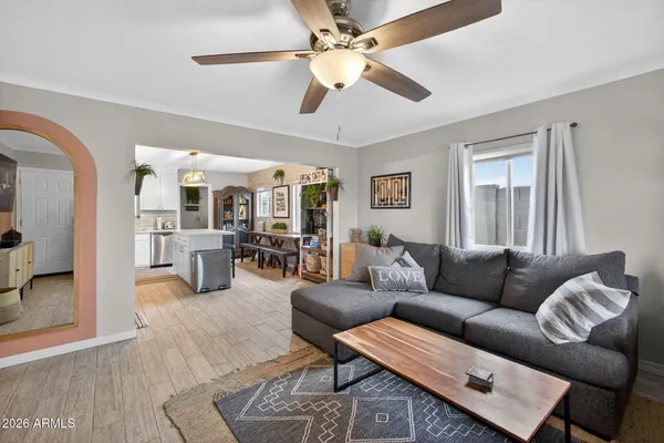 a living room with furniture and a window