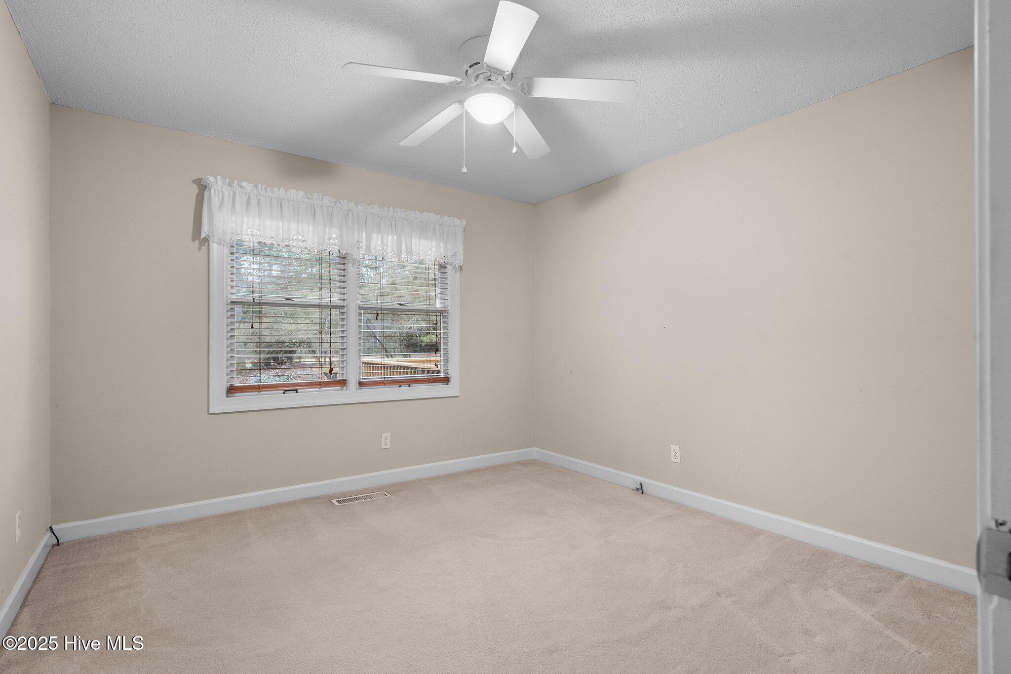 4094 Niagara Carthage Road Whispering Pines, NC 28327 - Photo 36 of 57 Second bedroom.