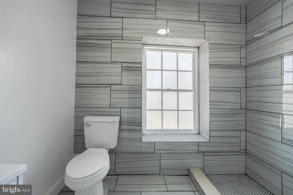 a bathroom with a toilet