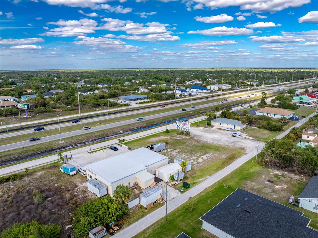 4275 South Access Road Englewood, FL 34224 - Photo 22 of 24 an aerial view of a city