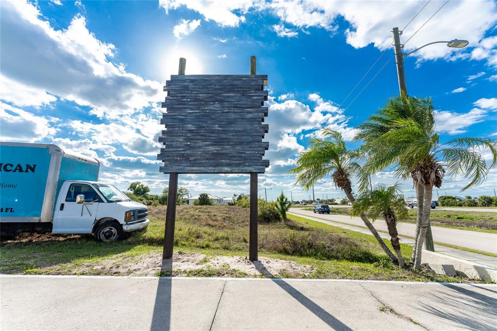 4275 South Access Road Englewood, FL 34224 - Photo 9 of 24 a car parked in front of a building