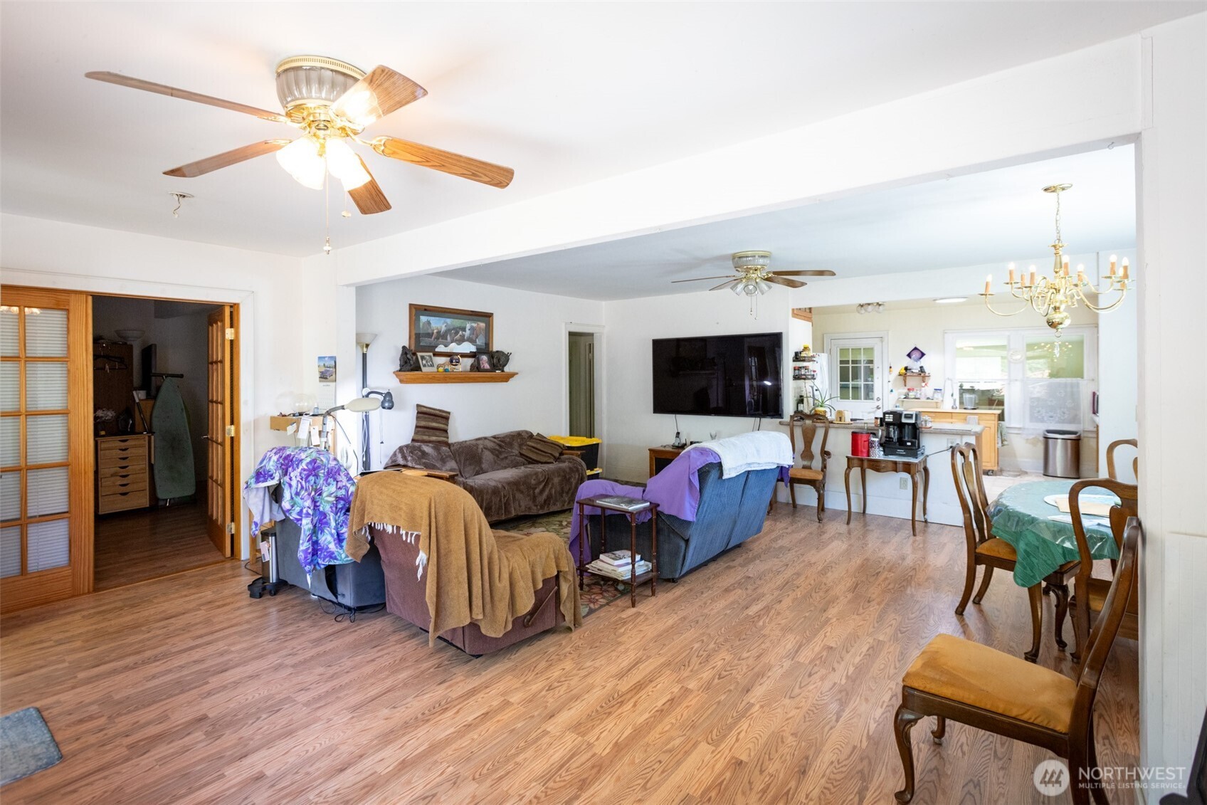 992 Highway 142 Lyle, WA 98635 - Photo 10 of 40 a living room with furniture and a flat screen tv