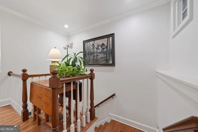a bathroom with a double vanity sink a mirror and a shower