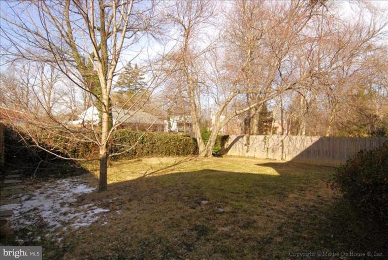 10114 Renfrew Road Silver Spring, MD 20901 - Photo 2 of 27 a view of yard covered with snow in front of house