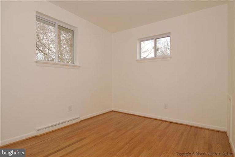 10114 Renfrew Road Silver Spring, MD 20901 - Photo 15 of 27 an empty room with a window