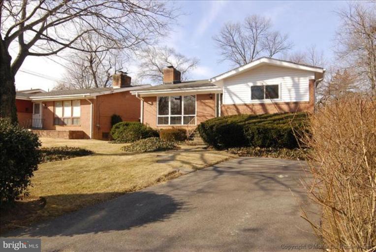 10114 Renfrew Road Silver Spring, MD 20901 - Photo 17 of 27 a front view of a house with a yard