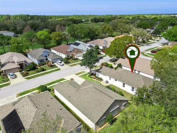 a view of a street with a big yard