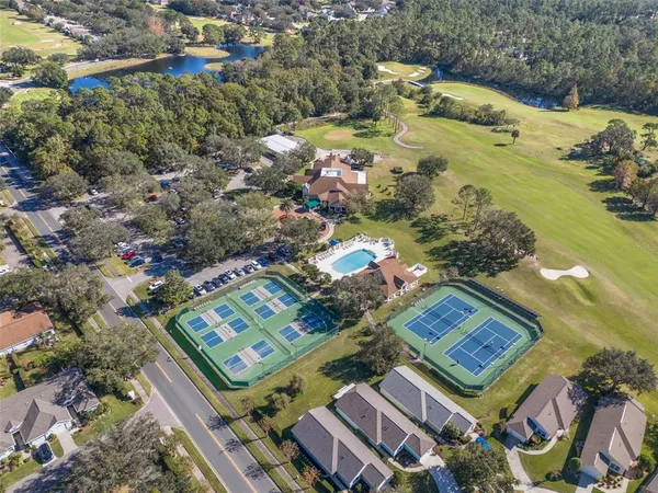 an aerial view of a house with a ocean view
